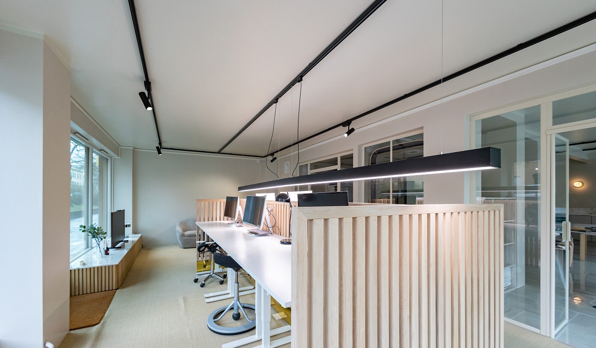 Office lighting with directional track lighting