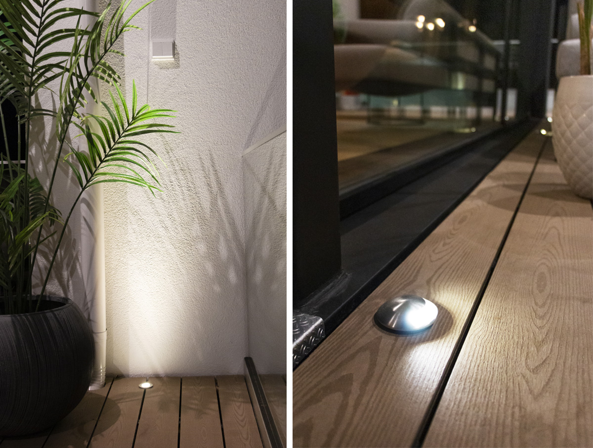 Jaa kuva kahteen osaan: vasemmalla sivulla tunnelmavalaistus, jossa LED-spotti valo ruukkukasvia ja luo kauniita varjo valkoiselle seinälle; oikealla puolella terassin valaistus, jossa pieni pyöreä LED-lattiavalaisin on upotettu puiselle terassille lasioven läheisyyteen. - LedStore TER-UP spots light reflects from the wall behind and TER-1 illuminates the deck surface.