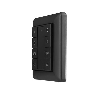 Alternative text: 'Black wall-mounted light switch with brightness and colour temperature buttons to control LED lighting.