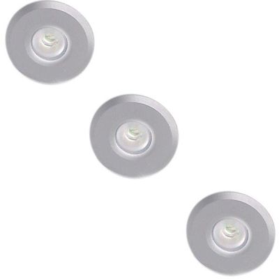 Three round silver coloured recessed ceiling lights on a diagonal white background. Energy efficient LED lighting for contemporary spaces.