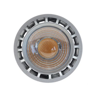 LED spotlight bulb with white vented housing and metallic contacts on a white base, ideal for energy efficient lighting solutions.