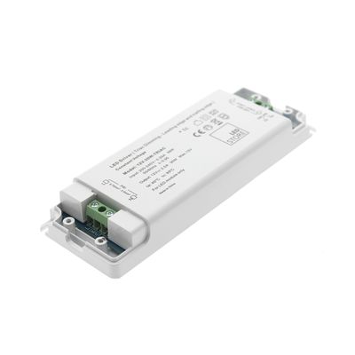 Rectangular LED controller with white housing, specifications printed on top. Connectors on one side for efficient and safe power supply of LED lights.