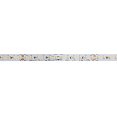 Close-up of a thin LED strip light displaying components and labels horizontally on a white background; ideal for energy-efficient lighting.