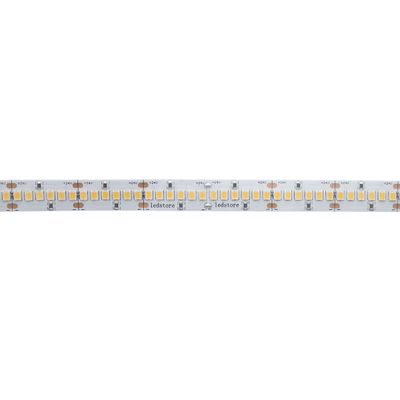 Close-up of a white LED strip light with several yellow diodes in a row on a circuit board for energy efficient lighting.