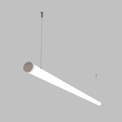 Elegant cylindrical LED pendant light suspended on wires, a modern energy efficient luminaire against a grey background.