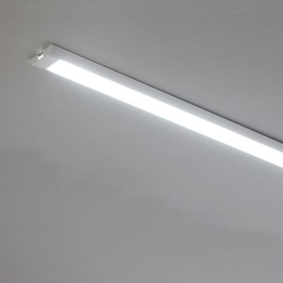LED tube ceiling light that provides bright, energy-efficient lighting for modern white interiors.