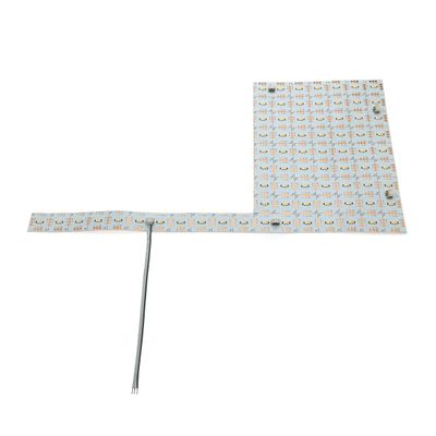 Flexible L-shaped LED strip light with small LED modules, connector and extension leads; ideal for versatile lighting solutions.