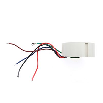 White cylindrical LED device with visible coloured wires (red, black, blue, green) on a white background to enhance lighting solutions.