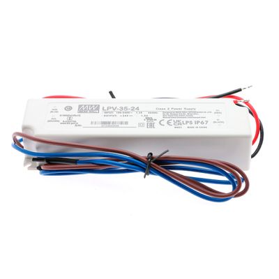 Rectangular LED power supply with attached wires and a label with technical information and certification symbols for efficient lighting solutions.