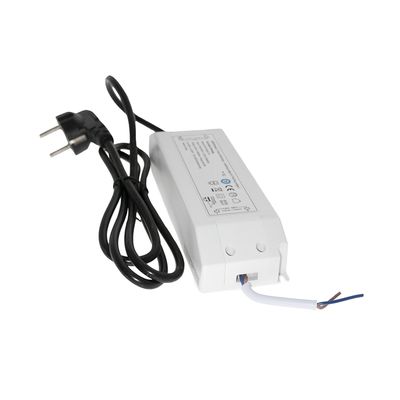 Rectangular LED power supply with white housing, visible wires, labelled information and plug; ideal for energy efficient lighting solutions.