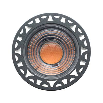 Silver-colored LED spot bulb, patterned glass lens, directional lighting, cool white light.
