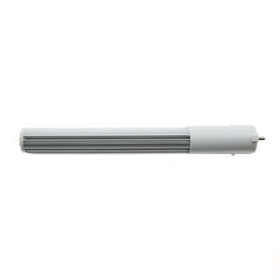 White and grey cylindrical LED lamp with ribbed sides on a pure white base, an energy efficient lighting solution.