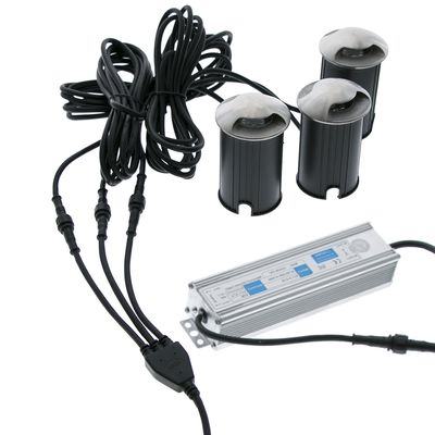 LED light source with multiple black wires, connected to three cylindrical lights with protective covers for safety.