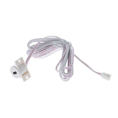 Coiled electronic cable with white connector and plastic component on white base, ideal for LED lighting solutions and installations.