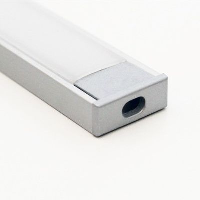 Close-up of a stylish white and grey rectangular LED luminaire on a plain white background with a modern design and a small hole detail.