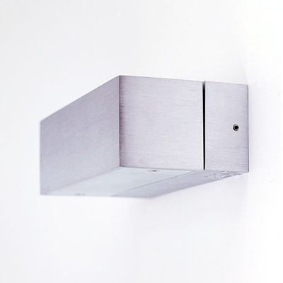 Rectangular metal LED wall light with white background; a modern lighting solution for home and commercial spaces.