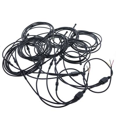 Black LED wires and connectors, tangled, visible bare wires on a white background.