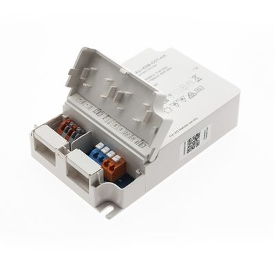 Grey electrical fixture with open lid, revealing colourful connectors and labelled compartments; ideal for LED lighting installations.