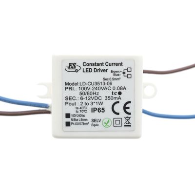 Alternative text: White constant current LED controller LD-CU3513-06 with visible wires and certification symbols, ideal for LED lighting solutions.