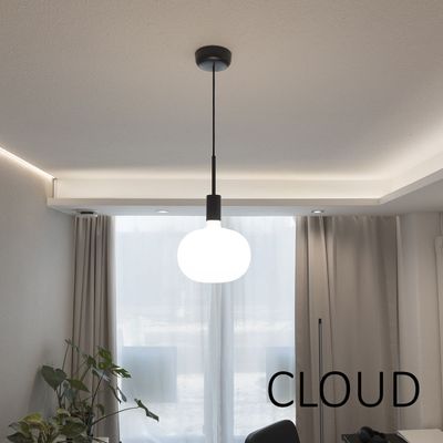 A contemporary room with globe-hanging LED light, curtains, potted plants and "CLOUD" wall decoration for elegant lighting.