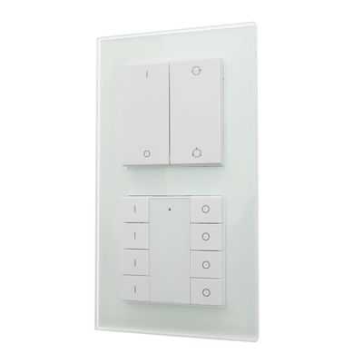 Alternative text: "LED light switch panel for the smart home with multiple buttons on a stylish glass backdrop for modern lighting solutions.