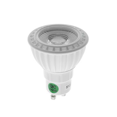 LED bulb with GU10 base and "QC PASS" stick, vertically mounted against a white background for LED lighting movement.