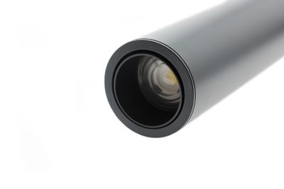 Cylindrical black LED spotlight with visible bulb on a white background - ideal for modern lighting solutions and energy efficient lighting.