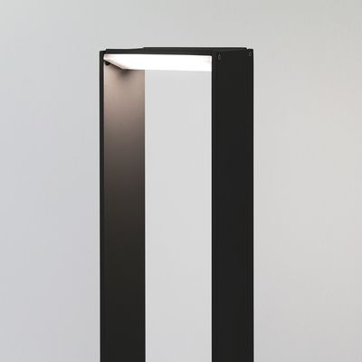 Elegant black floor lamp, minimalist design, rectangular, open, softly glowing white background. Perfect for modern LED lighting.