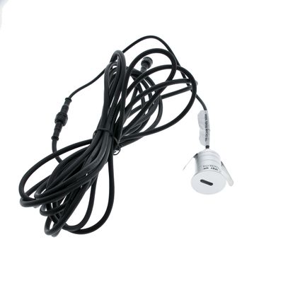 Alternative text: 'Twisted black cable with metallic device with USB port and labels on white background - LED lighting accessories available online.