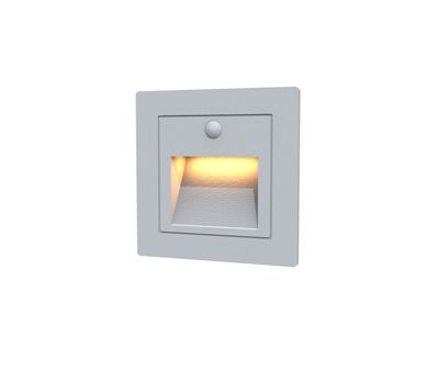 A square recessed staircase luminaire with a grey frame that gives a soft warm glow, perfect for enhancing safety and ambience in modern interiors.