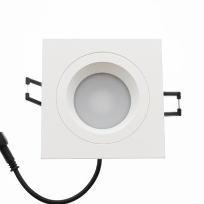 Rectangular recessed LED ceiling light, white finish, round design, black cable attached, energy efficient modern lighting for any room.
