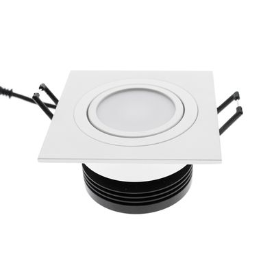 Square recessed LED luminaire with white trim, adjustable brackets; energy efficient lighting for modern interiors.
