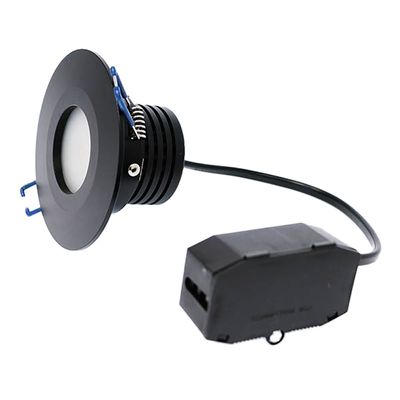 Black recessed LED downlight with black rectangular controller and cord, ideal for contemporary lighting solutions.