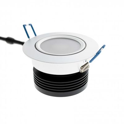 Energy efficient white recessed LED downlight with blue spring clips, bracket and black heat sink for modern lighting solutions.