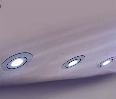 Modern recessed LED roof lights illuminate a stylish light roof, presenting energy efficient and stylish lighting solutions.