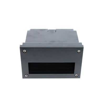 Black rectangular electronic device, front view, with vented features and corner screws, typically for LED lighting components or controllers.