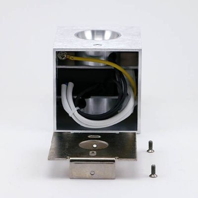 Square metal LED luminaire housing with wires, bracket and two screws on a white base - ideal for efficient LED lighting installation.