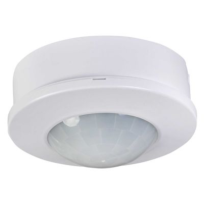 Ceiling-mounted dome-shaped white motion sensor for efficient LED lighting control.