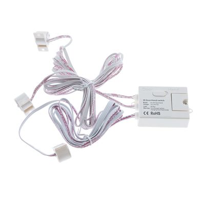 White electronic door switch with wires and connectors, ideal for LED lighting installations, with white background.