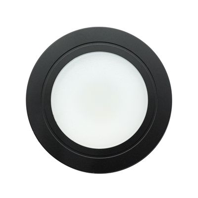 Round black LED ceiling light with frosted diffuser, viewed from below - a modern lighting solution for stylish interiors.
