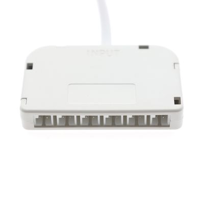 White electronic LED controller with connection ports marked "INPUT" on the top. The connected cable is shown for easy installation and use.