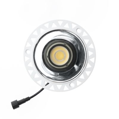 Round recessed LED luminaire with white decorative strip, triangular pattern and black power cord. Ideal for energy efficient modern lighting solutions.