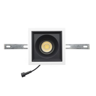 Rectangular recessed LED downlight with white decorative strip, centre bulb, mounting brackets and black side power cord. Ideal for contemporary lighting solutions.