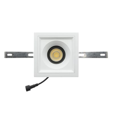 Rectangular recessed ceiling luminaire with round bulb, metal clips and black wire for SEO LED lighting.