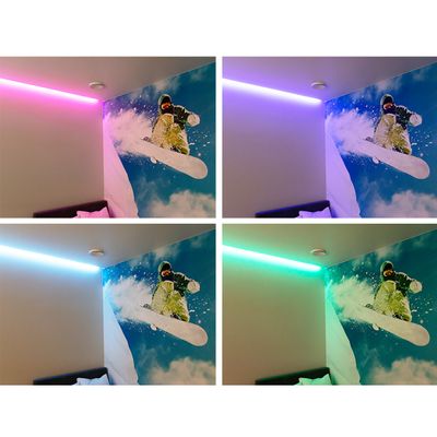 Snowboarder mural on the wall with pink, purple, blue and green LED lights to highlight the corner of the room. The versatile LED lighting options create the perfect atmosphere.