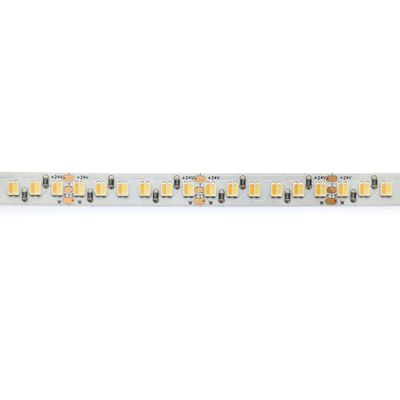 Close-up of an LED strip light with multiple yellow LED lights and electronic components on a white background, ideal for energy efficient lighting solutions.