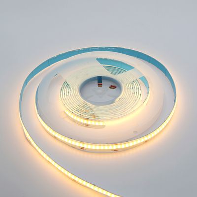 Warm glow LED strip light twisted onto a white surface - stylish, energy efficient lighting for homes and businesses.