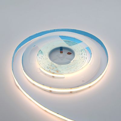 A white surface semi-glowing coiled LED strip light that presents flexible and energy-efficient lighting solutions for homes and offices.