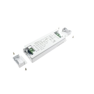 LED controller with green connectors, small mounting hardware and two end caps. Ideal for efficient lighting solutions and easy installation.