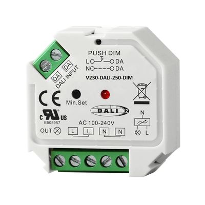 DALI DIM device with green connectors and labelled input/output ports in a white housing for advanced lighting control solutions.